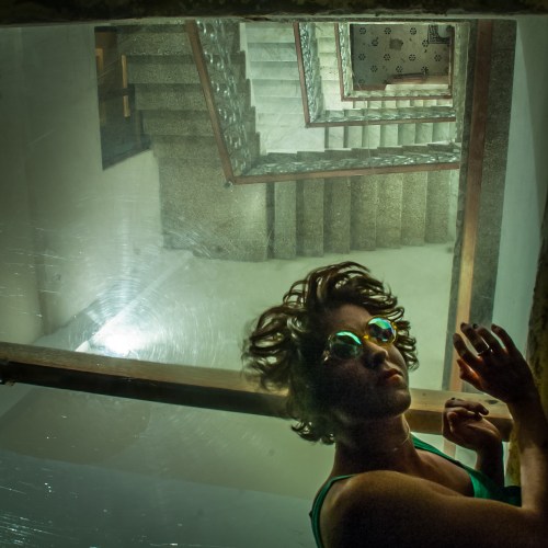 Photograph lying above a skylight over a stair case. I love the staircases in viejo san juan… they can be troublesome if you have a lot of luggage but I love the character and old world feel they give to the buildings there.
