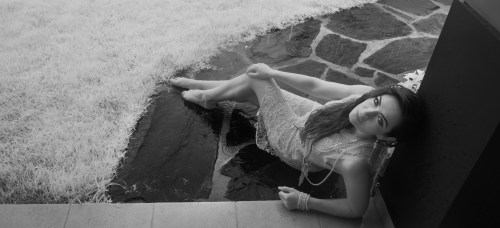 Mary Kate lounging in the door way as the rain falls still having fun with our photoshoot.