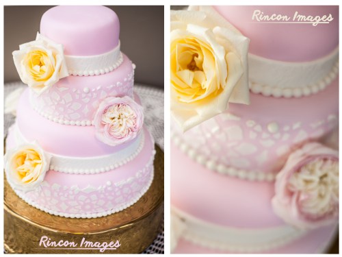 Photograph of a pastel pink wedding cake with white and yellow flower decorations taken by a wedding photographer in Puerto Rico.