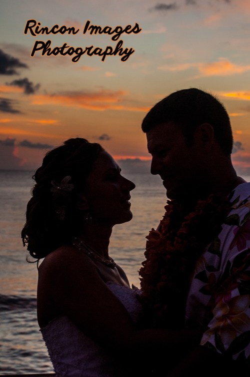 The bride and groom silhouette in front of the sunset after their destination wedding at Villa Cofresi Resort and Hotel in Rincon Puerto Rico.  Wedding photography by Rincon Images wedding photography. Wedding photographer Rincon, Puerto Rico.