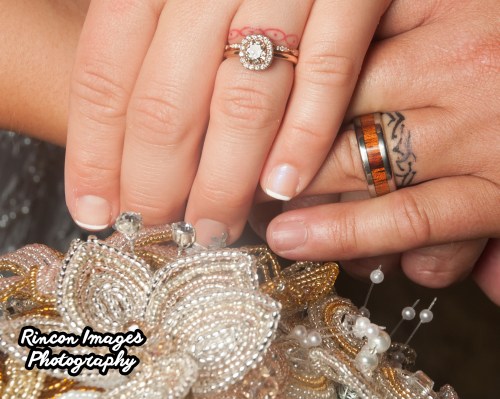 The bride and grooms wedding rings and wedding band tattoos. Wedding photograph by Rincon Images wedding photography. Wedding photographer Rincon, Puerto Rico.