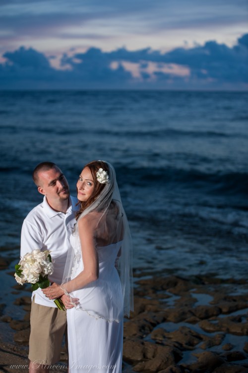 The bride and groom together during their post wedding sunset photo session.