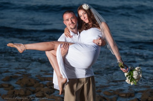 Or bride and groom, Brooke and Trevor having fun on camera.