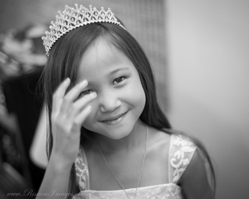 Brookes daughter, the flower girl for the wedding wearing her special tiara as her mom gets ready for the wedding ceremony.