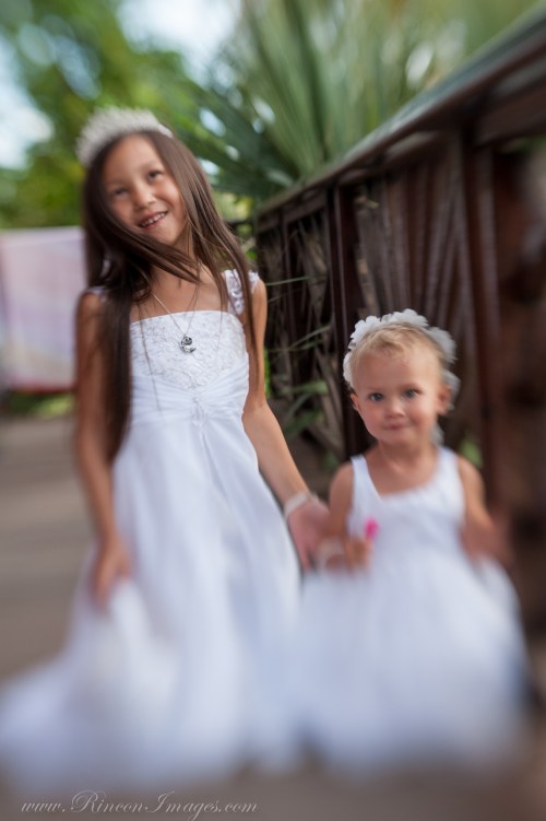 The two beautiful flower girls dressed in white for their mothers Rincon Beach wedding. I absolutely love photographing flower girls during weddings because they are so full of joy.