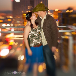 Trevor and Anastacia kiss on their balcony in Vegas the night before their wedding.