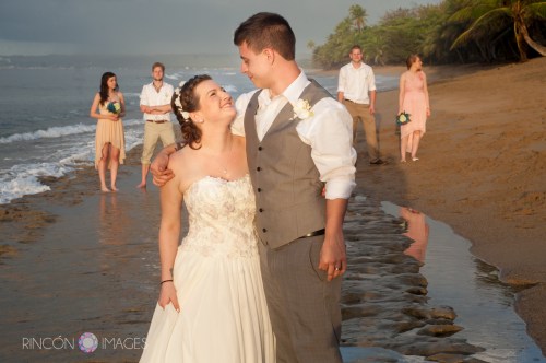 The bride and groom on the beach with their friends after the ceremony. A nice simple, fun wedding with great people.