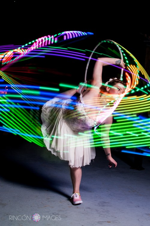 Jill cut off the bottom of her wedding dress so she could hula hoop in it after the wedding. Such a great idea!