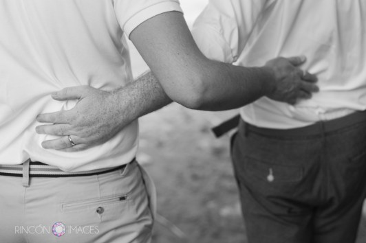 The two grooms photographed in black and white before their gay wedding celebration.