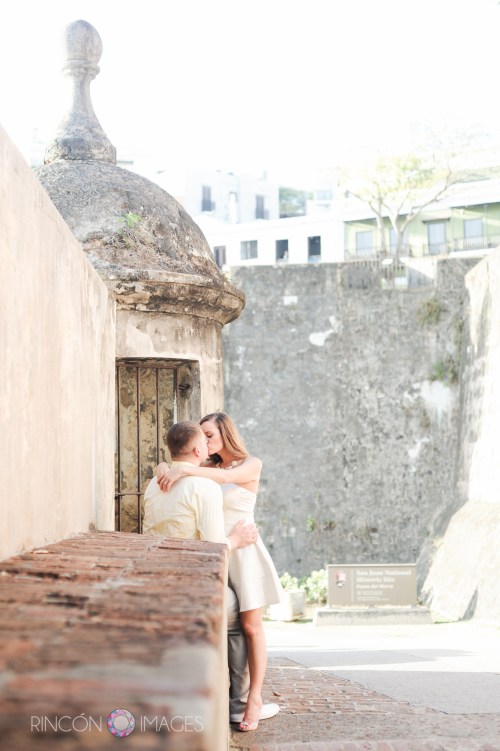 This photograph was taken right in front of the red doors on Paseo de la Princesa in Viejo San Juan, Puerto Rico. This kind of architectural detailing is iconic of Viejo San Juan, and is perfect for wedding and engagement photography sessions. Photograph by Rincon Images wedding photographer Puerto Rico.